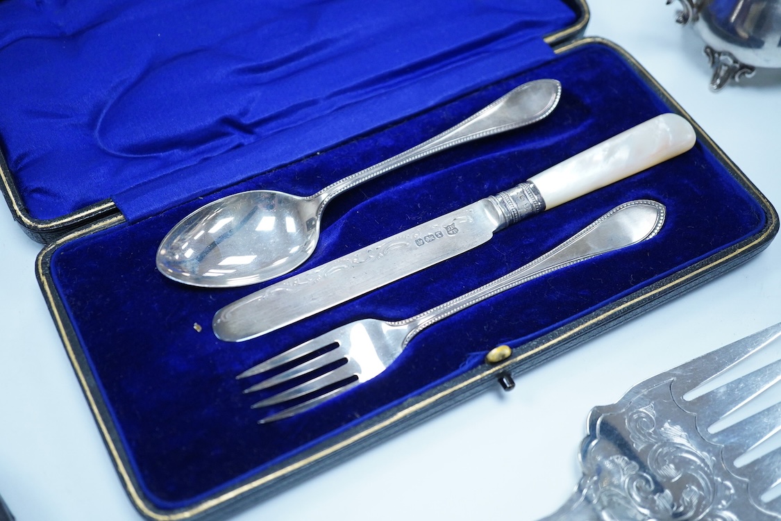 A cased pair of George III engraved silver Old English pattern berry spoons, by Smith & Fearn, London, 1794/5, 22.6cm, together with a cased Edwardian silver christening trio, an 800 standard mustard pot with white metal
